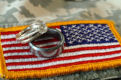 Wedding rings on an American flag emblem